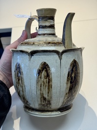 An Annamese or Vietnamese brown-glazed cream-ground 'lotus' ewer, 14th C.