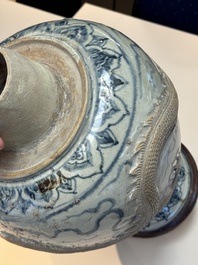 A large Annamese or Vietnamese blue and white inscribed altar vase, 16th C.