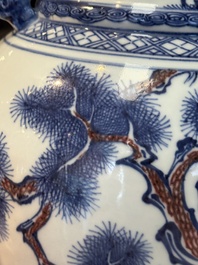 A Chinese blue, white and copper-red 'deer and pine tree' vase, Qianlong