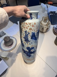 A Chinese gilt and iron-red decorated blue and white rouleau vase with figural design, 19/20th C.
