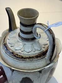 An Annamese or Vietnamese brown-glazed cream-ground 'lotus' ewer, 14th C.