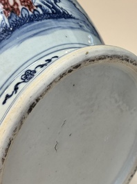 A Chinese blue, white and copper-red 'deer and pine tree' vase, Qianlong