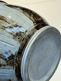 An Annamese or Vietnamese brown-glazed cream-ground 'lotus' ewer, 14th C.