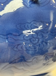 A Chinese blue, white and copper-red powder-blue-ground 'hu' vase, Qianlong