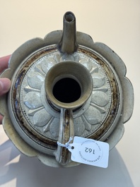 An Annamese or Vietnamese brown-glazed cream-ground 'lotus' ewer, 14th C.