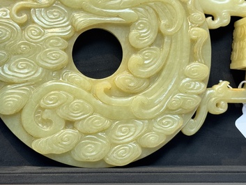 An imperial Chinese yellow jade 'dragon and phoenix' twin 'bi' disc, Qing