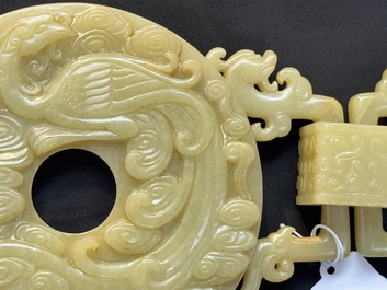 An imperial Chinese yellow jade 'dragon and phoenix' twin 'bi' disc, Qing