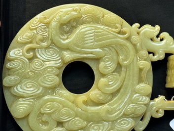 An imperial Chinese yellow jade 'dragon and phoenix' twin 'bi' disc, Qing