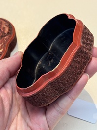 A fine Chinese red cinnabar lacquer ruyi-form 'Ba Man Xian Bao 八蠻獻寶' box and cover, Qianlong