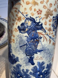 A Chinese gilt and iron-red decorated blue and white rouleau vase with figural design, 19/20th C.