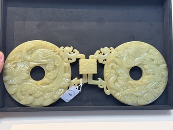 An imperial Chinese yellow jade 'dragon and phoenix' twin 'bi' disc, Qing