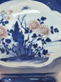 A Chinese blue, white and copper-red powder-blue-ground 'hu' vase, Qianlong