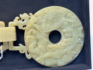 An imperial Chinese yellow jade 'dragon and phoenix' twin 'bi' disc, Qing