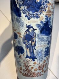 A Chinese gilt and iron-red decorated blue and white rouleau vase with figural design, 19/20th C.