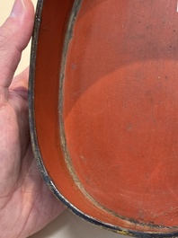 A fine and rare Chinese tortoiseshell-veneered and red-lacquered oval box and cover, signed Wang Wenzhi 王文治, Qianlong mark and of the period