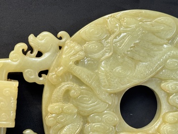 An imperial Chinese yellow jade 'dragon and phoenix' twin 'bi' disc, Qing