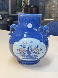 A Chinese blue, white and copper-red powder-blue-ground 'hu' vase, Qianlong