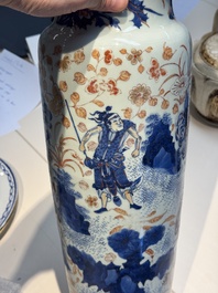 A Chinese gilt and iron-red decorated blue and white rouleau vase with figural design, 19/20th C.