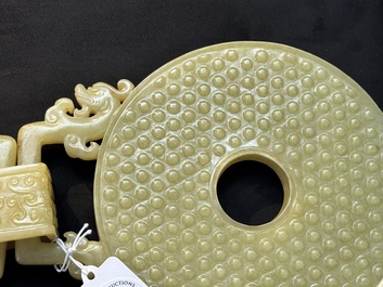 An imperial Chinese yellow jade 'dragon and phoenix' twin 'bi' disc, Qing