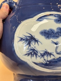 A Chinese blue, white and copper-red powder-blue-ground 'hu' vase, Qianlong