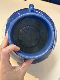 A Chinese blue, white and copper-red powder-blue-ground 'hu' vase, Qianlong
