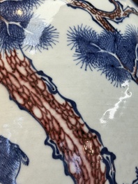 A Chinese blue, white and copper-red 'deer and pine tree' vase, Qianlong