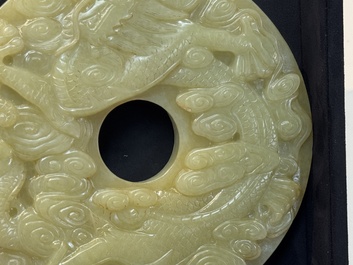 An imperial Chinese yellow jade 'dragon and phoenix' twin 'bi' disc, Qing