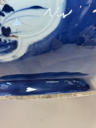 A Chinese blue, white and copper-red powder-blue-ground 'hu' vase, Qianlong