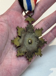 A Chinese 'Order of Extreme Bravery' medal (Order of the Golden Lion), inscribed Chi Dan 赤膽, Republic