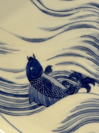 A rare large imperial Chinese blue and white 'dragon and carps' basin, Kangxi mark and of the period