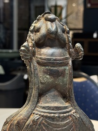 A fine and large Chinese bronze standing Buddha, Liao/Jin