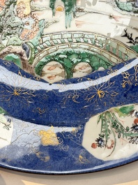 A Chinese famille verte powder-blue-ground 'landscape' dish, Kangxi