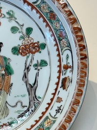A Chinese famille verte 'elegant beauties in a garden' plate, Kangxi