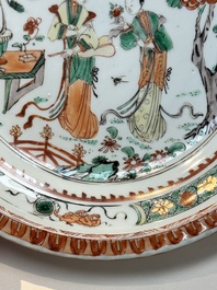A Chinese famille verte 'elegant beauties in a garden' plate, Kangxi