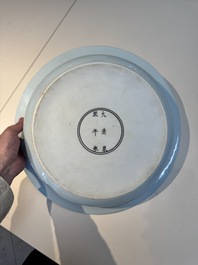 A rare large imperial Chinese blue and white 'dragon and carps' basin, Kangxi mark and of the period