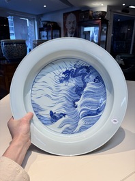 A rare large imperial Chinese blue and white 'dragon and carps' basin, Kangxi mark and of the period