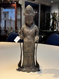 A fine and large Chinese bronze standing Buddha, Liao/Jin