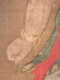 Chinese school: 'Deity and foo dog', ink and colour on silk, 16/17th C.