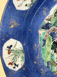 A Chinese famille verte powder-blue-ground 'landscape' dish, Kangxi