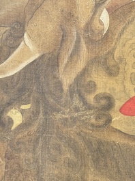 Chinese school: 'Deity and foo dog', ink and colour on silk, 16/17th C.