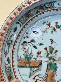 A Chinese famille verte 'elegant beauties in a garden' plate, Kangxi