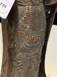 A fine and large Chinese bronze standing Buddha, Liao/Jin