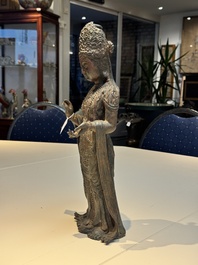 A fine and large Chinese bronze standing Buddha, Liao/Jin