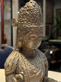 A fine and large Chinese bronze standing Buddha, Liao/Jin