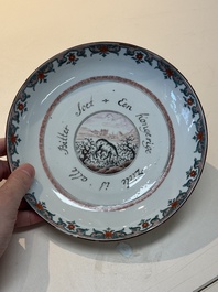 A pair of Chinese Dutch-decorated 'proverb' plates, 18th C.