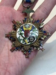 A Chinese 'Order of Extreme Bravery' medal (Order of the Golden Lion), inscribed Chi Dan 赤膽, Republic