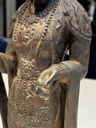 A fine and large Chinese bronze standing Buddha, Liao/Jin