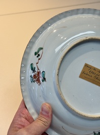 A Chinese famille verte 'elegant beauties in a garden' plate, Kangxi