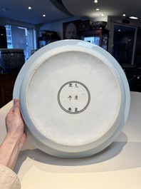 A rare large imperial Chinese blue and white 'dragon and carps' basin, Kangxi mark and of the period