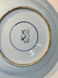A Chinese famille verte powder-blue-ground 'landscape' dish, Kangxi